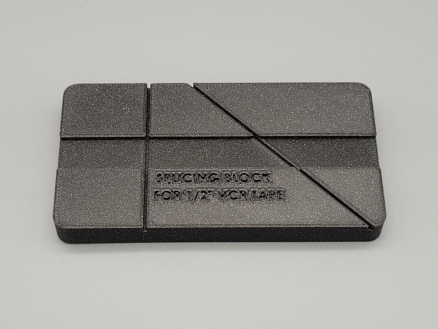 Splicing block for 1/2 inch VCR tape