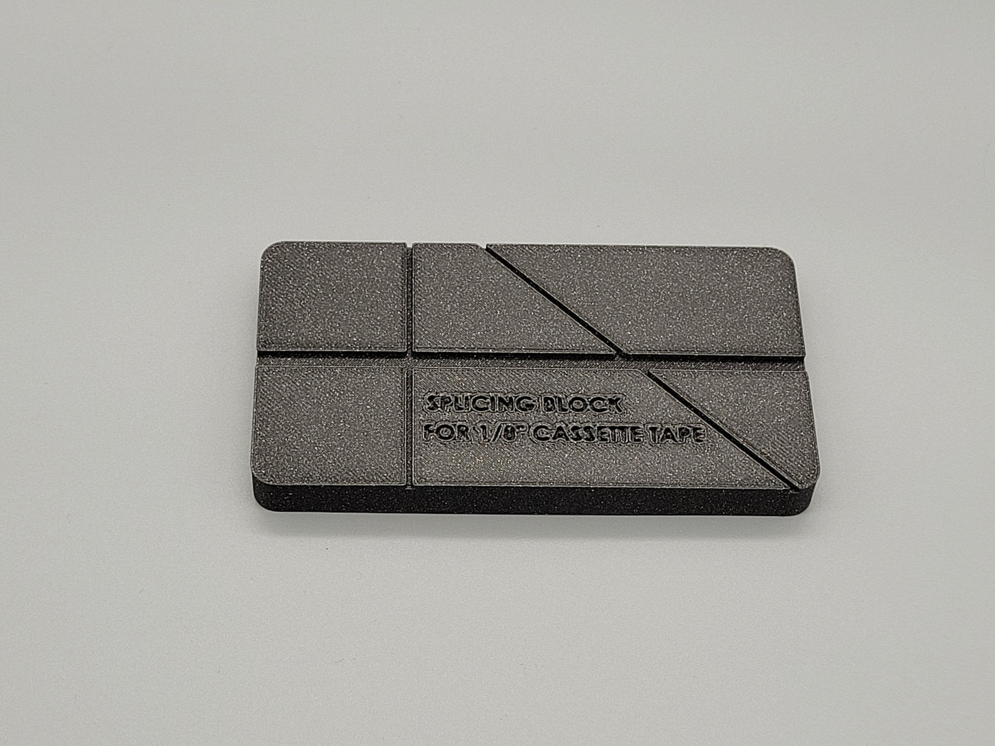 Splicing block for 1/8 inch cassette tape media
